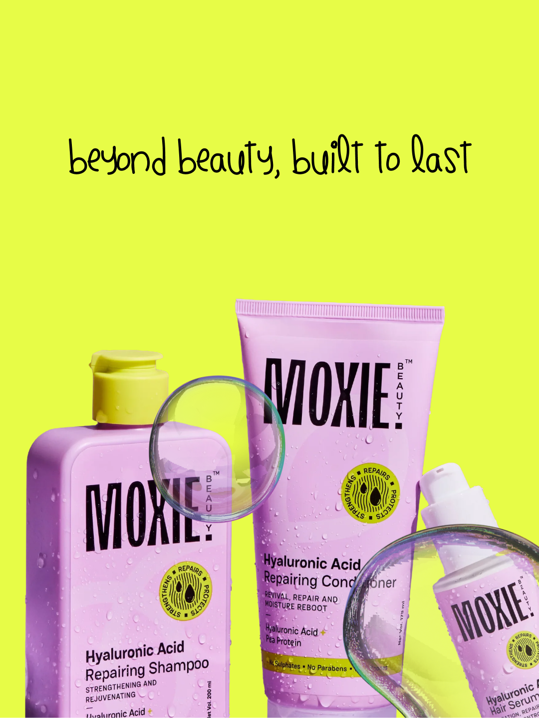 Moxie conditioner bottle with water droplets and a soap bubble
