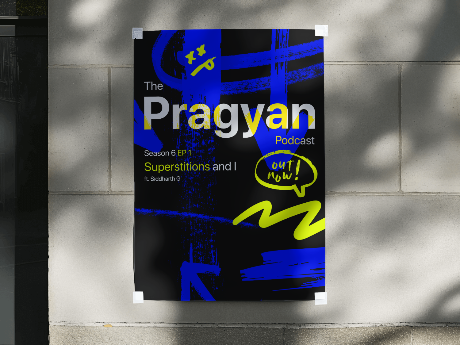 Pragyan Podcast poster taped to an outdoor wall