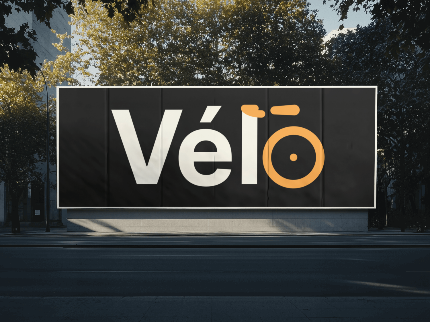 Vélo wordmark on an outdoor street billboard